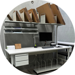 Packing bench with carton supplies