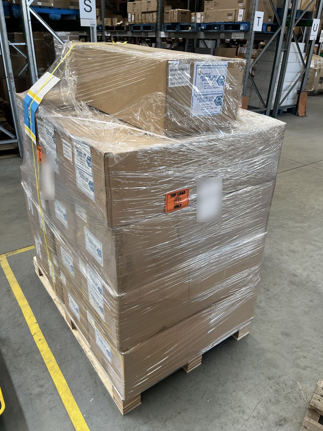 Pallet of cartons stacked, wrapped and strapped in the Satellite3PL warehouse