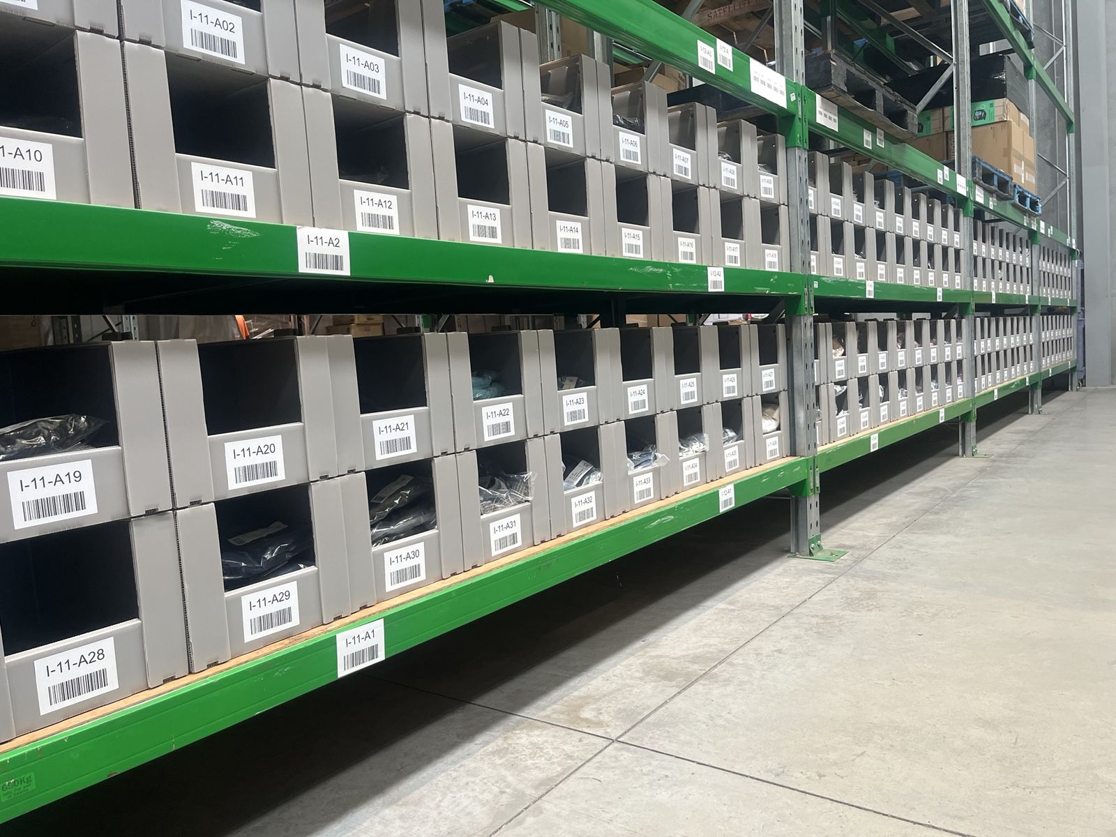 Rows of barcoded pick bins on racking at the Satellite3PL warehouse